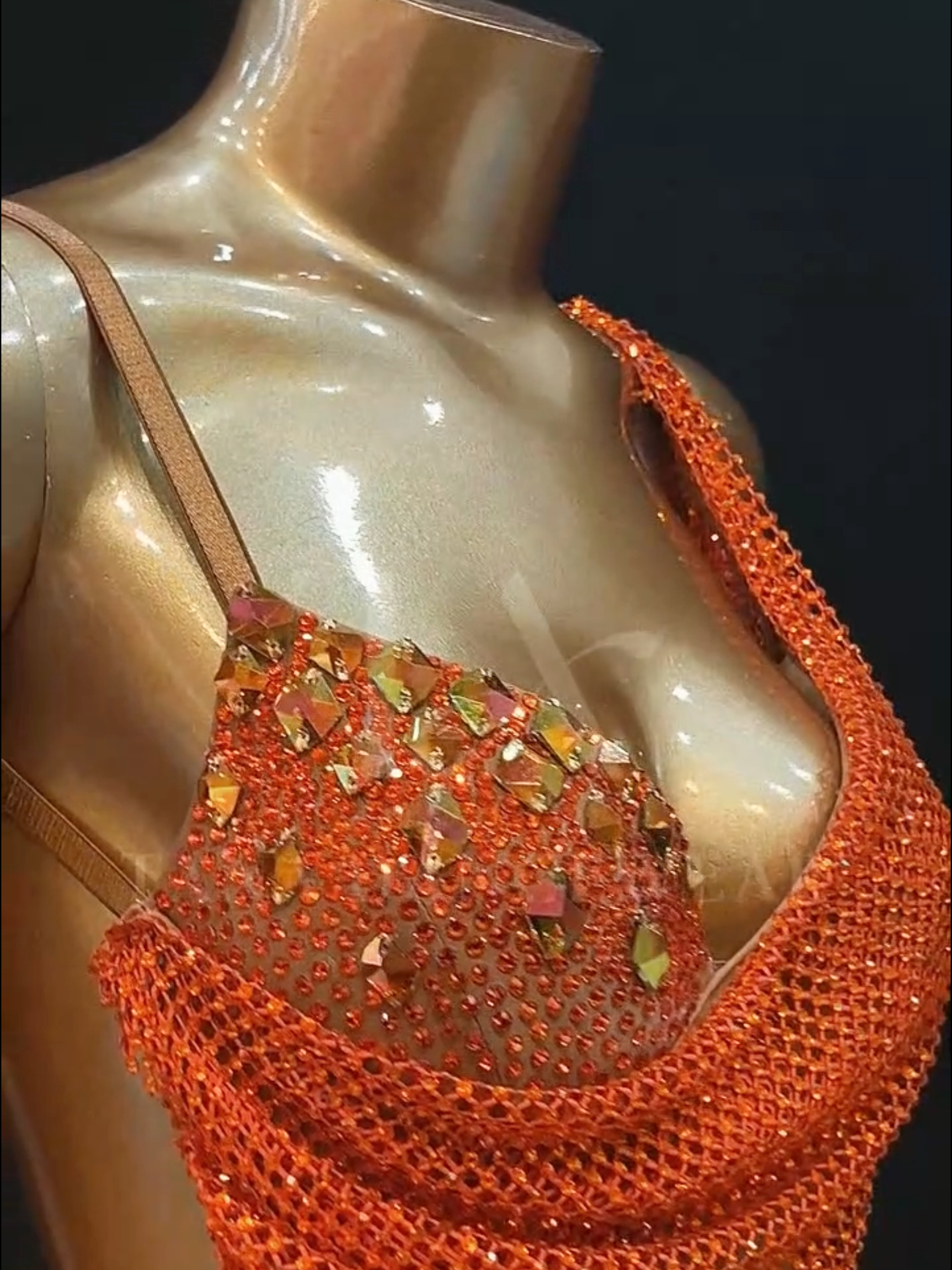 tana-women-competition-latin-dance-dress-orange-open-back (1) Sparkly orange open-back women competition Latin dance dress with lycra mesh, fringe and rhinestone details by Tana Dancewear.
